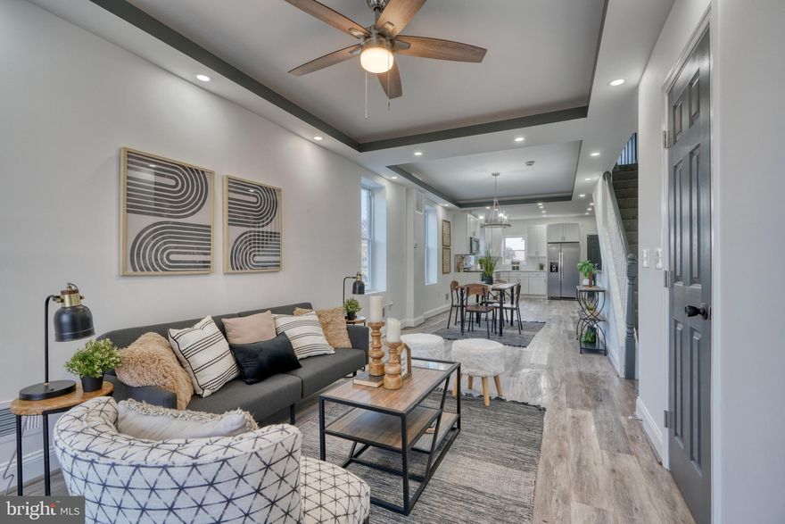 Welcome to 2701 Winchester! When you enter the house you are greeted with beautiful flooring, tray ceilings, and so much natural light. This lovely end of group townhome has an amazing OPEN FLOOR PLAN, STAINLESS STEEL APPLIANCES, QUARTZ COUNTERTOPS, MARBLE LIKE BACKSPLASH.  Upstairs, find three bedrooms, one with an EN SUITE, and the added convenience of UPSTAIRS LAUNDRY. The basement offers a spacious rec room, an EXTRA BEDROOM, and a full bathroom. There is a wonderful deck off the kitchen plus a garage in the rear yard. Don't miss this home- schedule a showing today!!