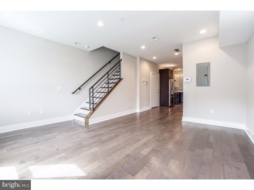 Welcome to 2512 Frankford Ave!  Four spectacular Bi-Level Condos completely renovated throughout.  Unit "B" Main Level features an open floor plan with large Living/Dining area, contemporary Kitchen with quartz countertop, marble tile backsplash, five burner slide-in gas range, counter depth refrigerator, and hidden control dishwasher. Ultra modern ceramic hall bath with tub, and one piece toilet.  Third floor contains two bedrooms,laundry closet, and an awesome ceramic bath with stall shower. Huge roof top deck with wonderful city views.  Tax abatement approved. Great location! 94 Walk Score. Convenient to Philadelphia Brewing Co, Martha, Memphis Taproom, Pizza Brain, and much more! Easy to show!