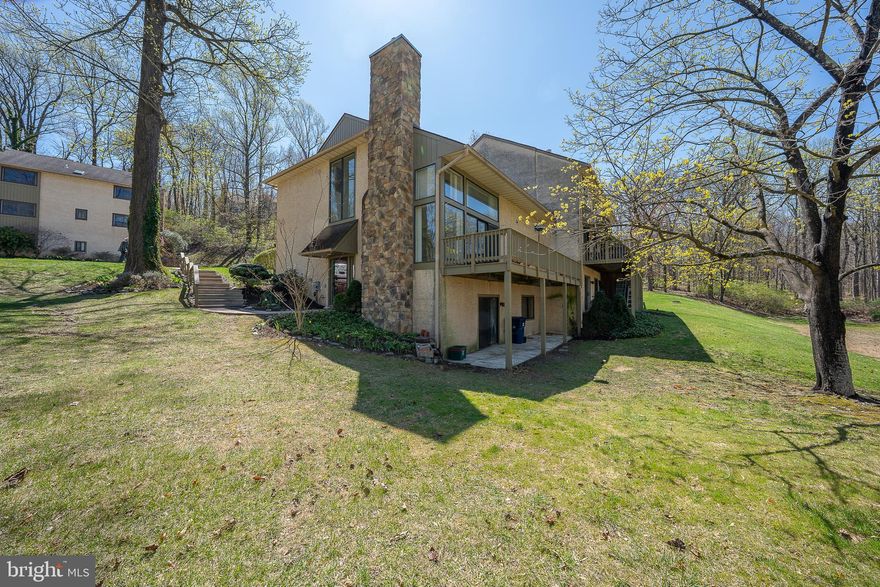 Welcome to this beautiful 3-bedroom, 2.5-bath end-unit townhome in the desirable Lynetree development, nestled in the heart of the West Chester Area School District. This meticulously maintained home offers a perfect blend of space, comfort, and convenience.  Step inside and be greeted by the impressive two-story living room with a cozy wood-burning fireplace, creating a warm and inviting atmosphere. The sliders lead to a private balcony, offering tranquil views of the surrounding woods, perfect for relaxation. The open dining room flows seamlessly into the kitchen, which is equipped with top-of-the-line Bosch appliances, including a dishwasher and large refrigerator, as well as a bright breakfast room for casual dining.  The first-floor primary bedroom suite is a true retreat, featuring a spacious outfitted walk-in closet and a luxurious en-suite full bath. A convenient half bath completes the main level.  The second floor boasts a versatile loft area with a skylight, offering additional living space. Two generous-sized bedrooms provide ample storage and comfort, one with a walk-in closet and the other with two closets. The full bath features a double vanity and skylight, creating a light-filled, airy space. A laundry room adds to the convenience of this level.  The lower level is home to a large family room, perfect for entertaining, with sliders that open to a private patio and expansive green space.  With easy access to public transportation, shopping, and dining, this townhome offers both tranquility and convenience. Don't miss the opportunity to make this wonderful home yours!