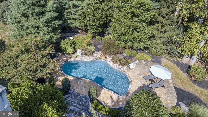 The Pool is open, enjoy your summer days & evenings in this private oasis!! This gorgeous home located at the end of the cul-de-sac in this desirable community of Indian Spring , public water & public sewer, this is not to be missed. This 5 bedroom, 4 full, 2 half bath home is the perfect entertaining house, Gorgeous POOL & 4-CAR garage, NEW Roof, all with a finished walk-out basement (6th bdr) & walk-up Attic. This beautiful, UPDATED custom built colonial boasts an open floor plan with attention to detail at every turn. Summer days will be spent at the well constructed Ted Pools, GORGEOUS pool on 1-acre landscaped lot which is truly an oasis!  Enter the 2-story, center hall Colonial, ahead lies the sunken living room with hardwood flooring and gas fireplace, great for entertaining. To the right is the bright & private Office surrounded by windows. To the left is the formal Dining Room with crown molding and wains coating. The gourmet Kitchen features a large island, custom Cherry cabinets, new Viking stainless appliances, double ovens and Sub-Zero refrigerator, and a newly added Butler's area with sink, extra cabinets & floor to ceiling Sub-Zero wine refrigerator. There is a built-in desk/organization station, Breakfast area & slider to the Treks deck. The cozy family room is adjacent to the Kitchen and has NEW hardwood flooring, cathedral ceiling, stunning window with French door to deck area, ceiling fan and gas fireplace. The master bedroom suite includes a sitting room, large bedroom, his and hers walk-in  California customized closets. The UPDATED master bathroom offers double sinks, large jetted tub and double shower, all beautifully tiled. There are four additional bedrooms and two new high-end, Updated hall bathrooms. The back hallway has a separate entrance to 2 bedrooms (or bedroom and sitting room) and a full bath which is perfect for in-laws or an Au-pair. The finished walk-out lower level features a bedroom(6th) and full bath and several hang out/TV areas for pool or ping pong and a butler area. The professionally landscaped yard with heated pool, Stone walkways & deck are stunning. New pool equipment--Public sewer installed 2015. Highly regarded Rose Tree Media Schools & a short drive to private schools. Close to the great town of Media with it's restaurants, shops & festivals and Newtown Square shopping centers. Convenient to 476, I95 to the airport or Phila. and 30 minutes to Wilmington. See it today!