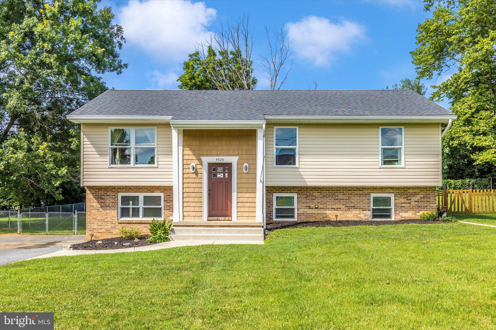 ***OPEN HOUSE*** Saturday, 7/26 from 11-1pm ***OPEN HOUSE*** Welcome home to this beautifully updated split foyer in Middletown! This recently renovated home features four spacious bedrooms and three full bathrooms. The main level boasts stunning hardwood floors, neutral paint throughout, and an eat-in kitchen complete with a large center island, granite countertops, and ample storage space. The lower level showcases brand-new LVP flooring, offering durability and style. Relax with your morning coffee on the deck while enjoying views of your fully fenced backyard, perfect for privacy and outdoor activities. Don't miss your chance to make this charming house your new home!