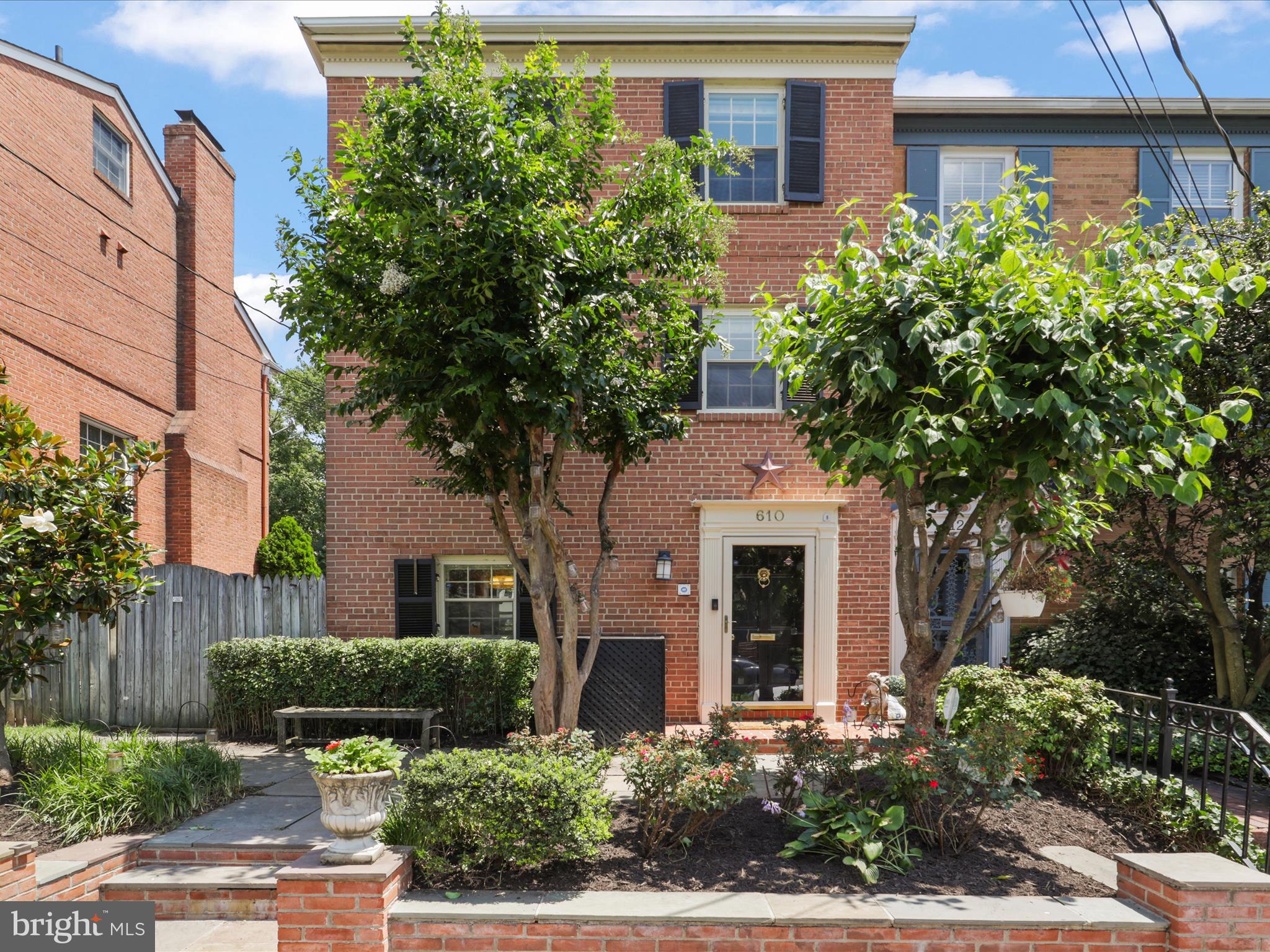 Prepare to be capitvated by this handsome, sun-filled end townhome with extra-deep backyard (almost double the normal size), ideally located in one of the most favored neighborhoods in Old Town. Entry level foyer leads to a large, cozy family room that opens to the backyard, a kitchenette, full bath and laundry. Main level is bright and open with large windows across the back and side. Hardwoods on 3 levels. Truly a joy to cook with a fabulous Italian Bertazzoni stove , well-designed cabinetry and exquisite quartz countertops. Two bedrooms upstairs, one currently used as an office, both with lovely views and lots of natural light. The family room offers two murphy beds for guests, doubling as a third bedroom. Step outside and you will find a tranquil and picturesque garden, landscaped perfectly for hosting guests on the patio or ground-level deck. Out front there is PRIVATE PARKING along the width of the lot. Four blocks to the Potomac, one block to Safeway (aka: the pantry), Balducci's 4 blocks; half-mile to King St shops and eateries; take free trolley (11a.m. to 11 p.m) to King St Metro. Walk to the famed Scottish parade