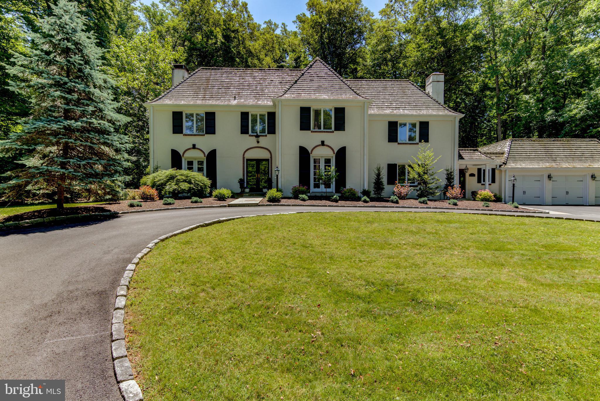Welcome to 533 Morris Lane. The picturesque setting will plant a smile on your face every return trip home and have you pinching yourself. Set among two mature private acres, the home boasts fantastic entertaining spaces that look like they were ripped from the pages of Home and Garden magazine. From the completely renovated pool and flagstone apron to the covered flagstone patio. Nestle up to the fire pit in the fall or simply retire to the front lawn in an adirondack chair sipping wine and listening to Darby Creek gently meander by. This French colonial home boasts four bedrooms, Five full bathrooms and two half half baths. A full bath is located in the breezeway, perfect for pool and party guests. Two half baths are located of the first floor family room, the other is located in the finished basement. One wood burning fireplace in the great room, just off the kitchen and two propane fireplaces located in the master bedroom and family room. Hardwood floors throughout all three floors of the home. The kitchen delivers what one would expect in a home of this caliber. Custom cabinetry and hutch from Paradise Custom Kitchens. Solid surface counters including Calcutta Marble. Cabinet paneled Viking refrigerator and Miele dishwasher. Wolf duel fuel electric oven and four burner propane gas range. The current owners have gone beyond lovingly maintaining, updating and adding to this home using highly regarded local Architect Anne Ledger. Work includes, enclosing and expanding the kitchen and breezeway between kitchen and three car garage. New driveway. Completely renovated pool with new heater, pump and mesh cover. Pool hardscaping and landscaping. Rebuilt bridge. Located in a tranquil neighborhood in Top rated Tredyffrin / Easttown school district and centrally located to some of the best Private schools in the country. For the golfer, some of the most respected clubs in Philadelphia if not the country are nearby: Aronimink, Waynesboro, Merion and Overbrook. This is truly a "must see" home that does not become available frequently in neighborhoods like this. Philadelphia International Airport is appx. 30 mins away. Nearby access to World Class Penn healthcare systems and some of the best dining and shopping all located within a ten minute drive. New cedar roof in 2020, not photographed.