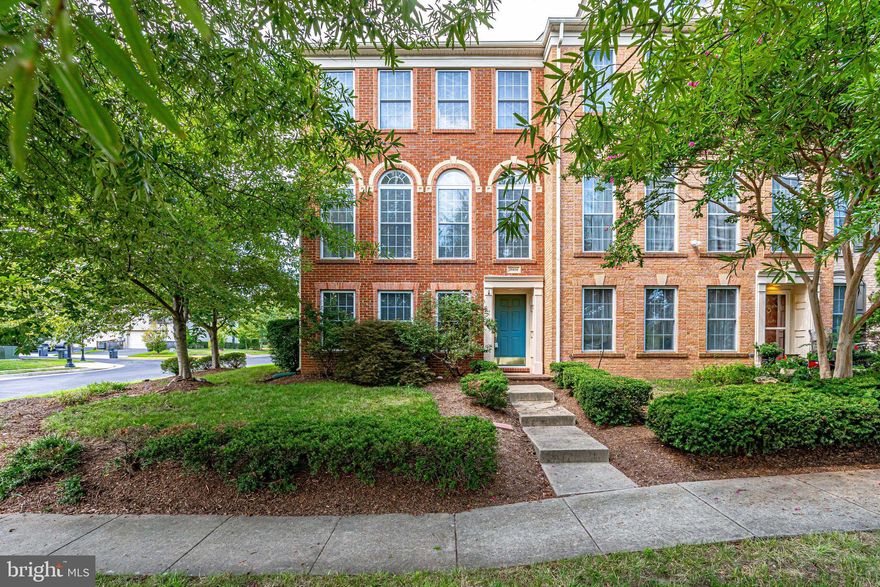 Brick front, end unit * 2 car rear entry garage with driveway for extra parking * Entry foyer leads into the rec  room with new luxury vinyl plank flooring * Powder room with hardwood floors  * Open main level with living room with ceiling fan * Family room with gas fireplace * Dining area * Gourmet kitchen with granite counters, center island with  cooktop, double wall ovens and tons of cabinet space  * Balcony off of the dining/kitchen area * Primary  suite with vaulted ceilings, a ceiling fan, walk in closet and  luxury bath * Upper level laundry * Secondary rooms with  vaulted ceilings * Dual zone HVAC * Community pool, tennis & tot lot