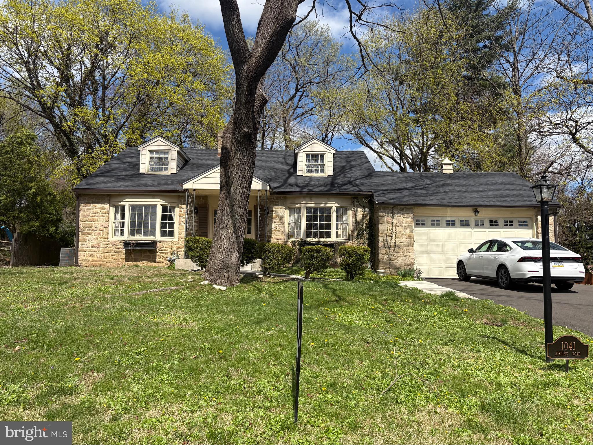 **PLEASE SUBMIT ALL OFFERS BY 8 PM ON 5/21.**
This 4-bedroom, 2-bath stone Cape Cod sits on a spacious lot in the sought-after Crosswicks section of Jenkintown. Featuring hardwood floors, and abundant natural light, this home blends classic charm with modern updates.
The home boasts a fully renovated spa-like bathroom with a glass-enclosed shower and dual vanity, as well as a second full bath ready for your personal touch. The unfinished basement offers great storage or potential, while the front porch, side patio, and backyard are generously sized and perfect for relaxing or entertaining. Enjoy peace of mind with a new HVAC system, roof, gutters, and garage door. This offers a solid foundation for buyers ready to bring their vision to the interior.
You must see this home to appreciate it. This is a fantastic opportunity for the most discerning buyer to own a classic home in one of Jenkintown’s most beautiful and desirable neighborhoods.
**BUYERS MUST USE SELLER’S TITLE COMPANY - THIS IS AN ESTATE PROPERTY AND REVERSE MORTGAGE DOCUMENTS HAD TO BE ORDERED.**