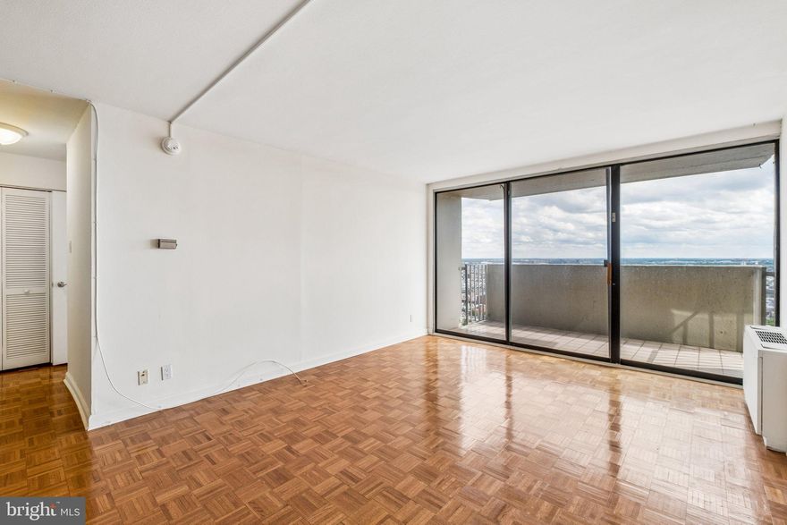 South-facing one bedroom with a balcony boasting dramatic views of South Philadelphia from a high floor at The Dorchester on Rittenhouse Square! The home enjoys a large living room with ample space for dining and entertaining, as well as floor-to-ceiling sliding glass doors that open to a private balcony boasting dramatic, unobstructed see-forever views to the south. The home's renovated open kitchen includes wood cabinetry, black appliances, and a breakfast bar. There is a generously sized bedroom with a wall closet and oversized windows offering spectacular southern views. A full hallway bathroom is easily accessible from both the bedroom and entryway and offers a shower/tub and large vanity. Residents of The Dorchester enjoy a 24-hour doorman and a fitness center. There is a garage and rooftop pool available for additional fees.