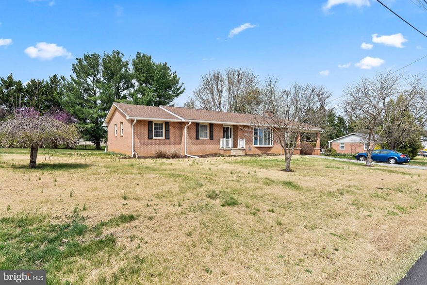 Welcome home to this attractive brick rancher offering comfort, functionality, and great outdoor space! The main level features a bright kitchen with durable tile flooring, cherry cabinets, granite countertops, and a convenient island—perfect for meal prep and gathering. Relax in the cozy living area highlighted by a fireplace (conveys as-is), with the option to add a ventless insert for enhanced efficiency and convenience. All three bedrooms are located on the main level, along with two full baths—one serving as the primary bath and the second conveniently located in the mudroom.

The finished basement adds valuable living space, including a bonus room, additional storage, and LVP flooring throughout, with newly installed carpet (Spring). The basement also includes baseboard heating and a waterproofing system with a transferable warranty for added peace of mind.

Step outside to enjoy the new deck overlooking a fully fenced backyard (chain-link), complete with a large concrete pad and storage shed—ideal for entertaining or relaxing.

The home features durable brick with asphalt shingles approximately 17 years old and recently replaced front gutters. Conveniently located with a school just behind the home.

Don’t miss this opportunity to own a move-in ready home with plenty of space inside and out!