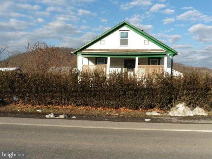 Cutest bungalow with large yard and garage in town surrounded by the gorgeous mountains and rivers of WV. Completed bath renovations, great kitchen and  a walk-in closet and half bath up adjoining bedroom. Large yard with garage. Sit on front covered porch or back deck and enjoy. Needs TLC.  FM First Look ends Jan. 13th for owner occupant buyers. $500 towards Home Warranty.