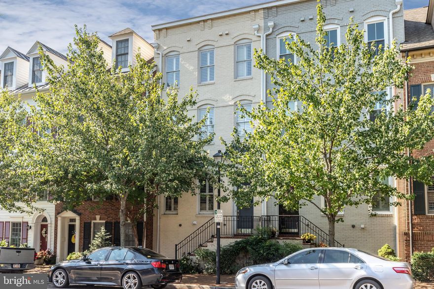 Stunning 4 level 2 car garage town home is a mere 4 blocks from the water in Old Town Alexandria! Open the door and step onto a custom slate entry highlighted with a wall of natural stone!  Gleaming hardwoods greet you as you easily walk from the large living space to the dining area and the bright kitchen beyond! This gorgeous home in Chatham Square boasts a totally updated open floor plan with a gourmet chefs kitchen, high-end appliances and a large island with bar seating! Upscale plantation shutter adorn the windows and make for convenient living. The lower level boasts a 2-car garage with loads of storage and a custom media room with a 75" large screen TV and a gas fireplace! The second level has a large master suite complete with large walk-in closet and a spa-like master bathroom with a soaking tub, large shower and dual vanities! The second bedroom has another full bathroom along with another walk-in closet. Continue up to the 4th level and be greeted with a large open flex space which can be easily used as an office, family room or guest area! This is also the level where you can step out onto the Roof-top Terrace and sit and relax. This home also conveys with a lovely Pagoda which provide shady relief when needed.  This is truly a rooftop Oasis!  The third bedroom is also on this level with the third full bathroom. Two HVAC units also make for comfortable living! The upstairs Heat Pump was replaced in 2018! This home is a short distance to Trader Joes, Harris Teeter and a plethora of Old Town shops, restaurants and trails and parks. Chatham Square even boasts its own tot lot! Enjoy the ease of Old Town living where everything is short distance away! Welcome Home!