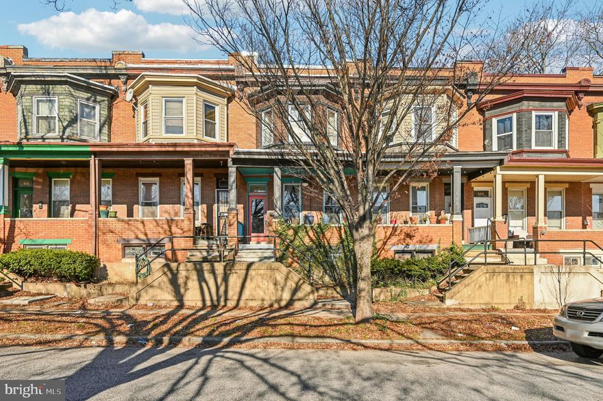 Welcome to 616 E 33rd Street—an income-producing Waverly rowhome offering exceptional flexibility for investors or owner-occupants looking to house-hack near Johns Hopkins’ Homewood Campus.
Per the seller, the property has generated $4,000+ per month through a combination of long- and short-term rentals, including room-by-room leasing upstairs and a separately accessed lower-level suite. Buyer to verify all income, licensing requirements, and future rental eligibility. No income or performance is guaranteed.
The upper level features three bedrooms and one full bath, a layout that has supported short-term, room-by-room rentals. The self-contained lower-level suite, currently leased month-to-month, includes a private entrance, kitchenette, full bath, and its own laundry, creating an ideal setup for a house-hack, multigenerational living, or dual-income strategy.
Renovated in 2014–2015 and impeccably maintained, the home offers a cozy front porch, sun-filled living room, dedicated dining area, and a stylish kitchen with granite countertops, stainless steel appliances, peninsula seating, plus the convenience of a main-level powder room. A skylight over the staircase fills the upper floors with natural light, enhancing the warm and inviting feel throughout.
Location is a major value driver—directly across from shopping, approximately two blocks from the Enoch Pratt Library, four blocks from the 32nd Street Farmers Market, and just seven blocks from Johns Hopkins. Easy access to Greenmount and St. Paul corridors puts dining, cafes, and everyday amenities right at your doorstep.
Whether you’re seeking a high-performing rental, a strategic house-hack, or a flexible city residence with built-in income potential, this Waverly property checks all the boxes.