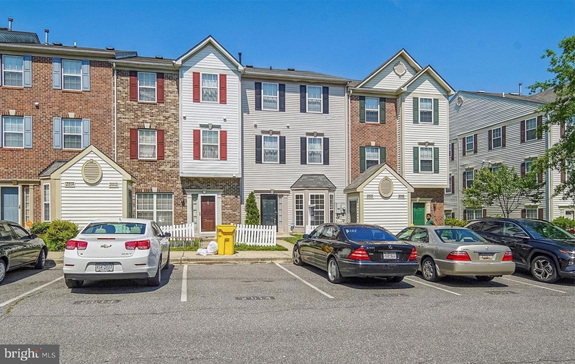 Gorgeous move in ready back to back townhouse (no rear yard). The townhouse features beautiful hardwood flooring throughout the main level. Updated kitchen with open floor plan. Kitchen with a large pantry and updated appliances. Large living / dining combo that appeals to many different arrangements. The first upper level includes the laundry a full hall bath and two spacious bedrooms. The second upper level is the large owners suite with a walk in closet and a huge full bath that includes a stand up shower and soaking tub. There is a small front yard with a storage shed. A community pool membership and access to a community center is available. There are two assigned private parking spaces for the townhouse (both directly in front of the home) .