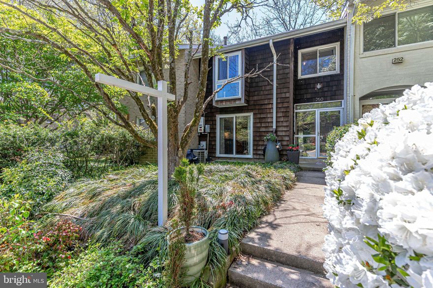 This wonderful larger townhome in New Mark Commons offers a bright and open floor plan with lots of living space with a perfect mix of charm and modern flair. Come enjoy living in this sought after community in a home that offers an updated eat in kitchen with silestone counters, upgraded cabinets and stainless appliances that flows perfectly to a large dining room and family room open floor plan with a view to the private fenced in back patio area which is great as an entertaining and relaxing space,  Enjoy the wood burning fireplace in the family room elegantly surrounded by a wall of built in shelving.  The top floor offers beautiful original hardwoods w/ three large bedrooms including a spacious master bedroom suite with two closets, an updated master bath and a picture window floor to ceiling that allows you to absorb nature's beauty.  The basement offers the potential for additional bedroom space with a window egress plus an area for an area for any additional family room or rec room with new laminate flooring and a large utility/workshop room with laundry.  The home has replaced windows, HVAC 2011, water heater 2014, kitchen updated 10 years/master bath, 5 years, plus solar that offers reduced energy costs.   This quiet neighborhood offers jogging paths, a lake, a communication pool, tennis and basketball and walking distance to downtown Rockville, Metro, shopping and restaurants as well as quick to 270, 200 and 355.