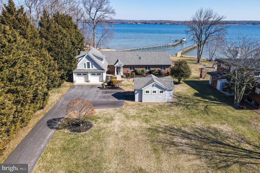 Welcome to 45454 Steer Horn Neck Road in the private waterfront enclave of Half Pone Point. Situated on over an acre of land with 150ft of waterfrontage on the Patuxent river, this bright 4 bed /3 bath, 3,400 sqft home boasts gorgeous views of the river from nearly every room.  In the heart of the home sits the open concept kitchen, living and dining room. The kitchen features a granite island with bar seating and updated stainless appliances (2020). Off the kitchen is a dining room (or den) that leads to an amazing screened porch area of the deck. Stairs to the second level above the garage lead to a studio/in-law/au pair apartment complete with a full bathroom, living area, kitchenette and storage area. 

At the other end of the hardwood-floored main level is the primary suite and 2 other bedrooms. The primary suite offers  a large walk-in closet with custom wood organizers, shelves, drawers, and an island with additional storage/drawers and a hidden ironing board. The primary bathroom is all tile with a soaking tub and walk-in shower. The main level is completed by two large bedrooms, 3rd full bath, and a separate laundry room equipped with washer/dryer, counter, utility sink and additional storage closet. 

This lovely home has a beach area, two operational boat lifts, approximately 100ft pier with slip, 4+ MLW and three jetties to prevent erosion. In addition, there is an encapsulated crawl space, a water treatment system, 5-year-old dual-zoned HVAC system, as well as a two-car front load garage under the studio and a detached one-car garage. Located next to 2 mile Half Pone Loop!
