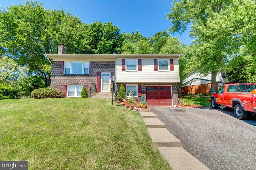 Beautiful 2 year old renovation!  Kitchen features 42" cabinets, granite and SS appliances.  Hardwood floors in Living and Dining room which opens out onto the comfortable and large porch.  Huge backyard, perfect for BBQ, entertaining. Updated bathrooms w/new vanities, fixtures and flooring. Large Rec Room with fireplace. This charming home is ready for you.  Open Sunday 1-4 PM