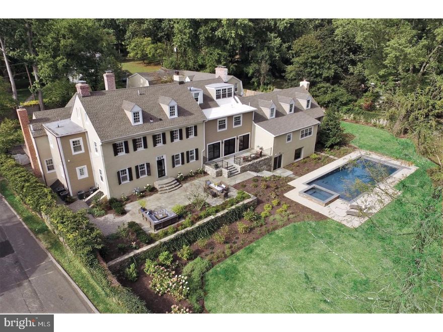 Extraordinary property bordering the Wissahickon Valley, Fairmount Park; "Andorra Corner" (circa 1722) offers the discriminating buyer a country estate at the edge of Chestnut Hill. Walking  distance to the head of Forbidden Drive and all the trails of the Wissahickon ravine, and the Morris Arboretum. Property includes the main house with 5 bedrooms and 5 ensuite baths, living room, dining room, office, kitchen with great room, butler's pantry, second floor laundry, powder room, mudroom, playroom, finished basement with exercise room, changing room, bathroom, and walk-out to pool area. Meticulously expanded and renovated for 21st century living, the home offers expansive and flexible living space for day-to-day living, and exceptional architectural features that set the stage for memorable entertaining.  Enter the front door off the driveway courtyard to a gracious foyer.  To the right is an intimate formal living room with fireplace.  There is also a quiet wing off the front entrance that houses a library/office, bedroom, and full bath. Back to the foyer and to the left is a spectacular light-filled gallery with three sets of French doors that lead to the landscaped patios, grounds, and pool area.  From the gallery, you will reach the dining room, butler's pantry, kitchen and great room, and backdoor mudroom. To call the room at one end of the house, the kitchen is an understatement.  The great room which houses the kitchen, family room, butler's pantry, and informal dining area is a showstopper. Wolf and Subzero appliances. Beautiful marble counter tops. Custom cabinetry.  Vaulted ceiling. Spectacular lighting. There is a breezeway that leads to the fabulous carriage house with a two bedroom apartment on the second floor and four box stalls on the lower level. The garage is adjacent to the carriage house. Up a dedicated staircase is the master suite with serene bedroom, large dressing room, separate walk-in closet, beautiful bathroom, and separate sitting room. In the opposite wing of the second floor are two large bedrooms with each their own spacious bathrooms.  Yes, this oasis has it all.  Extraordinary finishes of marble, stainless steel, custom cabinetry, dramatic lighting, and fine flooring, are what you would expect from a house of this ilk; but the walled perimeter, the multiple fireplaces, the access to Fairmount Park, its proximity to Chestnut Hill and the rest of Philadelphia, and its history set the property above expectation.