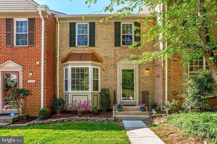 Wonderful townhome in Forest Estates! Completely move-in ready, with 3 finished levels, 3 bedrooms, 2.5 bathrooms, and approximately 1,870 square feet of finished space. Main level features an inviting living room and dining area with hardwood floors, a completely renovated kitchen with sliding door to large deck overlooking the backyard and trees, and an updated half bathroom. The upper level has three bedrooms and a fabulous full bathroom.  The finished lower level has a sliding door to the backyard and large flagstone patio, large family room (or possible 4th bedroom), full bathroom, closet with built-ins, and unfinished utility room with plentiful storage space. Extensively renovated and meticulously maintained. Over $150K total invested by current owner for home improvements, including: hardwood floors, designer kitchen, designer upstairs bathroom, updated lower level, windows and sliding doors, flagstone patio, roof, HVAC system, water heater, added insulation in attic, and high-quality carpeting and paint. Comes with 2 assigned parking spaces (both #29) outside the front door. Conveniently located, less than 1 mile from I-495 and the Forest Glen Metro Station, and 0.4 miles to the inviting Evans Parkway Neighborhood Park. And, there’s a nice tot lot and a basketball court 500 feet away, just down Green Holly Terrace. Overall, this is a great opportunity for the discerning buyer looking for a quality, turnkey townhome in a quiet community and a great location. *** Offer deadline is Monday, April 26 at 5 pm. Thank you. ***