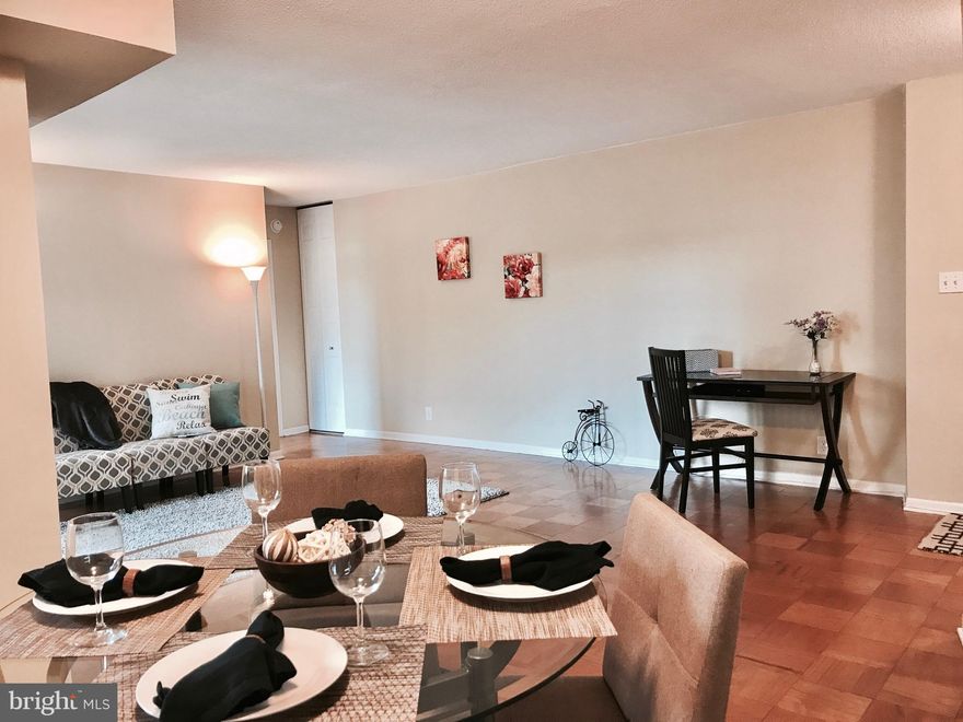 Spacious 860 sq ft centrally located 1 bd/1 bth w/ front load W/D.  Secured garage,Beautiful views of trees and open space, wonderful amenities including indoor pool, 24 hr concierge.  Bus pulls in front drive, 2 blocks Whole Foods and indoor access to metro.  ALL utilities incl in condo fee *Please make sure to ask other buildings about past assessments.  This building has done reno with CC fee