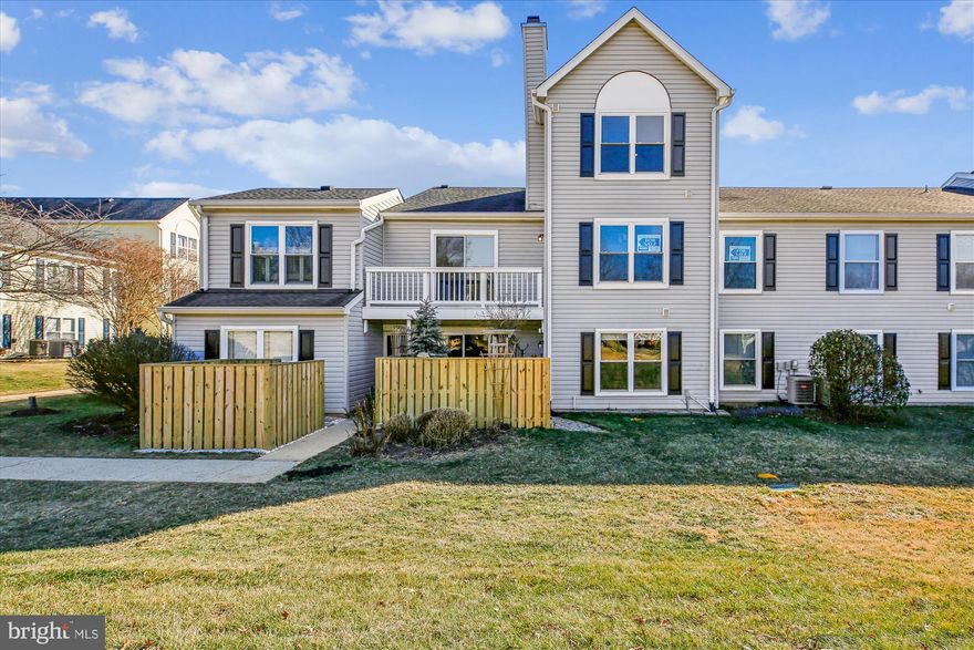 This move-in ready, perfectly maintained 2BR/2BA condo has a private entrance, with the look and feel of a townhome. Features light and bright vaulted living room ceilings and a cozy wood-burning fireplace. The main level has an eat-in kitchen with granite countertops, separate pantry and brand-new stainless appliances. First bedroom features a walk-in closet and adjacent full bath that offers ideal guest space or flexible living. Step onto the private balcony to enjoy fabulous views of quiet, open green space. 
Upstairs on the second floor, the private primary suite spans its own level with three closets and en-suite bath, creating a true retreat. Washer and dryer in unit. Community amenities include pool, tennis, trails, picnic areas near shops and library. A rare combination of privacy, views and location!