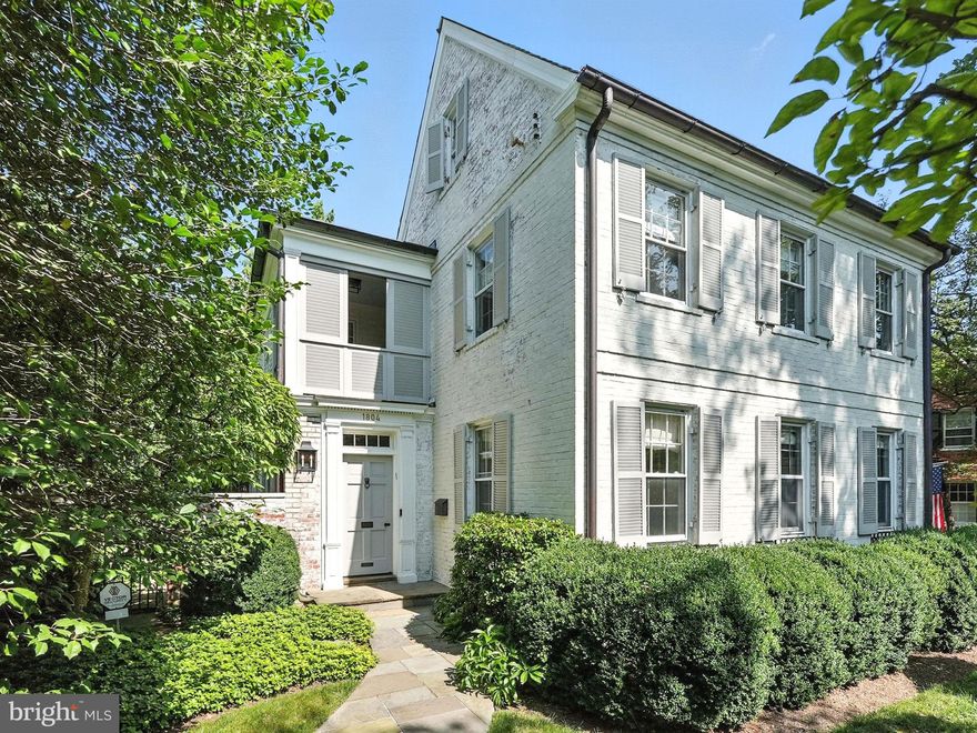 Welcome to this exquisitely reimagined Colonial residence, nestled on a tree-lined street that feels worlds away from the city, yet is right in the heart of it all. This whitewashed brick home exudes timeless curb appeal while offering nearly every modern amenity across four expansive levels.

Step inside and discover a thoughtful blend of original character and curated upgrades. Five bedrooms, four and a half baths, and a layout that flows effortlessly from formal to casual spaces make this home as functional as it is beautiful. The main level offers a sun-splashed living room anchored by a stately fireplace, a dramatic formal dining room with designer lighting, and a chef’s pantry that connects seamlessly to the gourmet kitchen. Outfitted with Viking appliances, a massive island, breakfast nook, and coffee station, the kitchen is designed for hosting and everyday ease.

The upper levels house a luxurious primary suite complete with a custom walk-in closet, built-in vanity, spa-like ensuite bath, and a private screened balcony. Upstairs, a charming playroom/attic space offers endless versatility, while the fully finished basement boasts a cozy den with a fireplace, laundry room, media room/golf simulator, and generous storage.

Outside, enjoy the low-maintenance turf yard with a putting green, all surrounded by a privacy fence that enhances the home’s serene, tucked-away feel. Additional perks include a mudroom, large windows that flood every room with natural light, and elegant hardwood flooring throughout.

One block away, find secluded access to Glover Archbold Park, which has a nearly 2.5-mile main trail that stretches the length of the park from Van Ness Street to the C&O Canal. The park's northern section also has an additional section of trail, bringing the total to approximately 3 to 4 miles of walking trails.

Rich with original charm and wrapped in sophisticated updates, in an unbeatable location,  this is a rare opportunity to own a home that lives like a private sanctuary without ever leaving the city!

**Information deemed reliable but not guaranteed. Square footage is approximate and should not be used for property valuation."