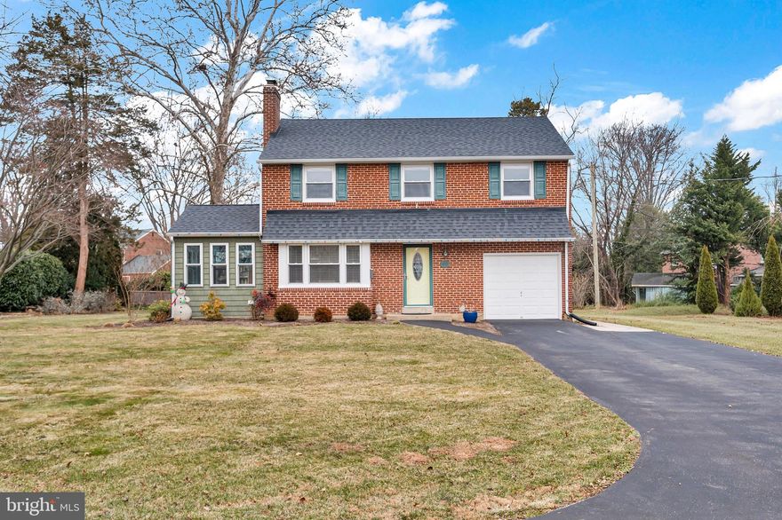 Don't miss this beautiful 4 bedroom two-story home in this super popular community!  Just wait until you see this home which sits on almost 1/3 acre lot in this lovely neighborhood.  As you arrive, you will see the huge driveway with plenty of parking for the family.  When you enter the Living Room, you will immediately feel the warmth and comfort of this home with the beautiful woodburning fireplace, hardwood floors and a lovely Sun Room adjoining this room.  The formal Dining Room is spacious and has beautiful chair rail molding and beaming hardwood flooring.  The updated Kitchen has a 5 burner stainless range with two ovens,  griddle, and faucet only 3 years young, built-in microwave, dishwasher and refrigerator included along with great cabinet and counter space.  The updated Family Room has a vaulted ceiling, ceramic tile flooring and access to the beautiful patio and hardscape knee wall and amazing rear yard!  There is a convenient first floor Den/Office and main floor updated Powder Room.  The second level also has beautiful hardwood flooring,  new large expanded full bathroom with closet, ceramic tile in 2021, deep linen closet and spacious bedrooms.  The large Main Bedroom has a Hunter Douglas fan, two closets, motion sensor lighting, and there is access to the attic through one closet.  The ready to finish basement has new windows, loads of space to add more rooms if you need it.  Some of the other great features are:  brand new gas hot water heater 2025, new roof in 2020, maintenance free brick and vinyl exterior, updated gas heater and central air conditioning in 2017, updated tilt-in easy clean windows, five Hunter Douglas fans, electric 200 amp.  This location is awesome because you are on the quiet side of Baynard Boulevard and close to shopping, easy access to I-95 to get to Wilmington or Philadelphia quickly, great restaurants, train stations, public transportation, swim clubs, library, parks, a short walk to the Carrcroft Elementary School and the list goes on and on!  This one will not last!