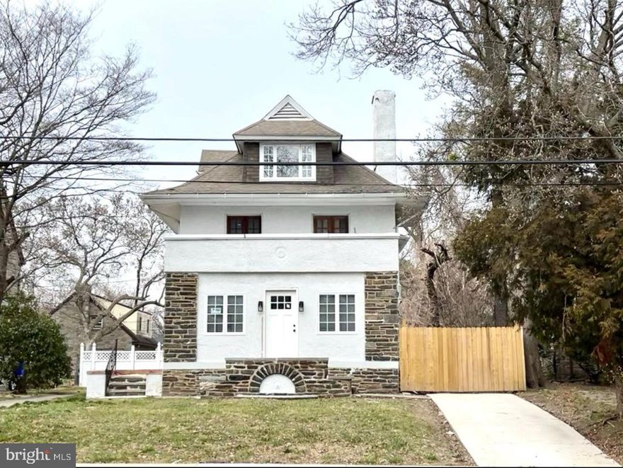Beautiful stone Chalet with Spacious 6 bedrooms 4.5 baths and an office on the main floor which could be used  as the 7th bedroom. The home features newer kitchen with newer stainless steel appliances, formal dining room , living  room and  a large bonus room. .  There are three bedrooms and two full baths  each on second and third floors.  Primary bedroom has en suite full bath and 3 closets. All bedrooms are spacious.  Laundry is on the main floor adjacent to kitchen with access to rear yard. All lights are energy saving LED. The home is dual zoned central Heat  and AC so air is not comprised on the top floor. Basement is unfinished and a walk up stairway to rear yard/parking lot.   Rear yard is completely fenced,  has  a detached garage for storage or renovate and create additional living space. Yard can be used as parking lot  for 3+ cars.   This is a great home for a big family or  can run a child care business as it it zoned RDM3. (Please verify with local zoning boards)This  home  has so much potential for the right home owner or investor.  Home is located minutes  to Shopping Center and multiple eateries. Walking distance to local universities and schools.  Important updates: new gas meter,  newer sewer drain to street, concrete driveway. Home is sold "as-is" condition.  U & O is buyer's responsibility.
