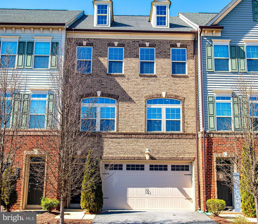 Welcome to 2934 Middleham Ct and this gorgeous townhome which has been thoughtfully laid out over 4 levels of open concept living, capped by 9ft ceilings and located on a private cul-de-sac to ensure your privacy. The entry level has plenty of extra finished space and can be accessed from the garage or interior staircase. There is also a rough-in to create another bathroom for even more versatile living. The second level boasts a spacious kitchen with a 13ft island ideal for every gathering. There is cabinet and pantry storage galore, wood flooring, a powder room and a deck for grilling and relaxing. There are also generous dining and living room areas flanking the kitchen area so you can always be in the mix when entertaining a group or a cozy night in. One level up hosts 3 bedrooms, including the first of what could be 2 primary suites, a well appointed primary bath and another full bathroom and a separate walk-in laundry. The 4th floor or "penthouse level" is where you can enjoy sweeping views of the treetops on the upgraded top deck with plenty of room for even more entertaining. This floor can also be used as a primary suite with a full bathroom, walk-in closet and large storage area. Each level is laid out for function and ease of use so you can truly enjoy every corner of this stunning home!! The community center with pool and fitness center is an absolute dream for anyone. All of this is located just minutes from 295, Fort Meade, Arundel Mills Mall, Maryland Live Casino, BWI Airport, Train Station and much more!