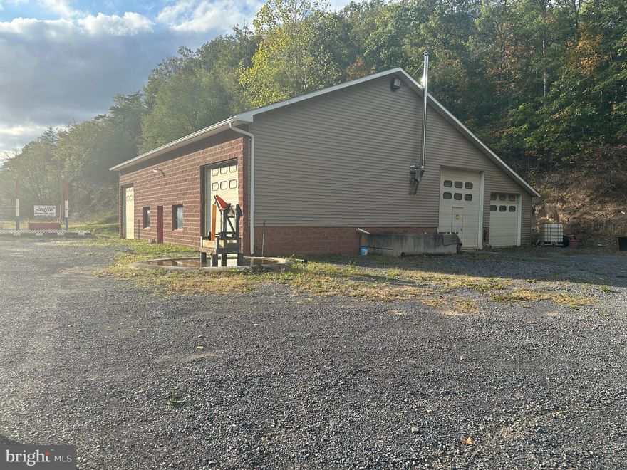 Commercial property located on Route 50, offering a prime location for your business. Boasting an expansive 1.47 Acre lot, this property presents a multitude of opportunities for various industries. The property features four high door truck bays, allowing seamless loading and unloading operations. In addition to the office and truck bays, this property offers generous storage space, multiple office areas, restroom and plenty of room for parking. The storage area is easily accessible. Situated on Route 50, this 
 property benefits from high visibility and excellent exposure to passing traffic. 
Don't miss out on this incredible opportunity to establish or expand your business in a highly sought-after location. Contact us today to schedule a showing and explore the endless possibilities this commercial property has to offer.