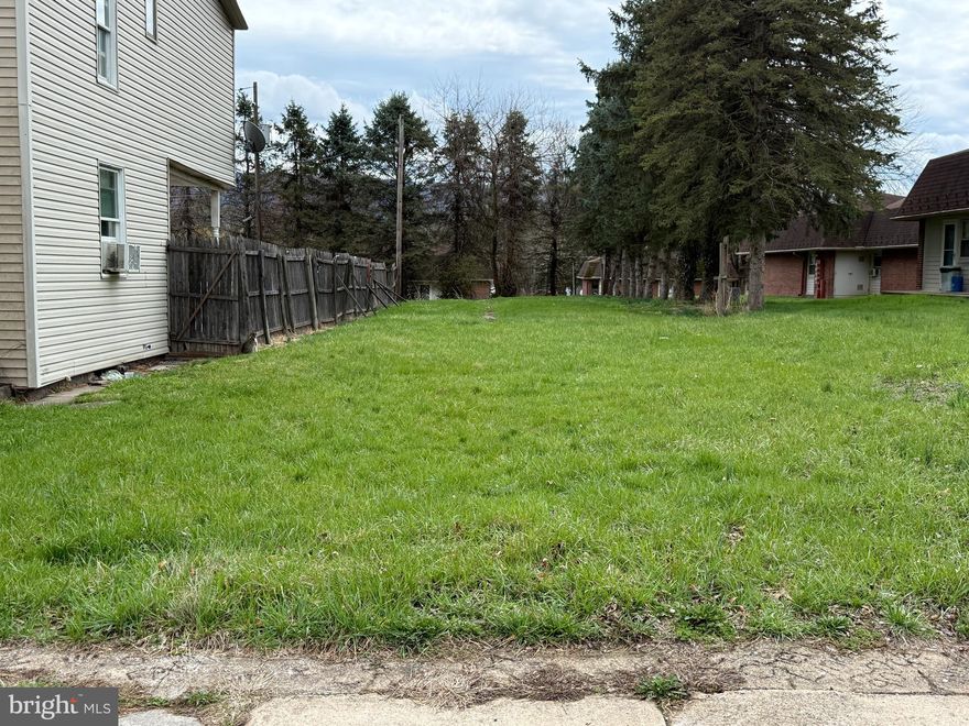 Vacant lot in the Borough of Lewistown. Manufacturing-Industrial zoning allows for this lot to be used for many different uses. Public utilities are available. This lot could be used for residential or commercial uses.