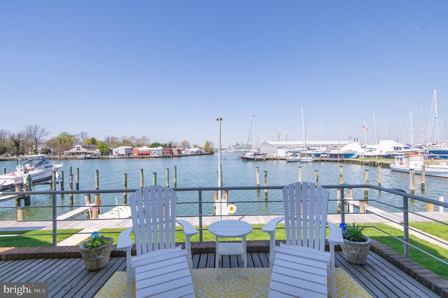 WATERFRONT End unit on Cambridge Creek with 20' x 40' deep water Boat slip within walking distance to all downtown restaurants, shops, brewery and bars.  One of 5 end units with views of the Choptank River Lighthouse, Choptank River & Cambridge Creek.  Completely redone in last 2 years: 2 new AC units, Waterview kitchen with breakfast bar, center island with bar stools, table space, all new cabinetry, countertops, sinks, plumbing fixtures and appliances.  Master Bath redone with new walk-in shower, linen closets, vanity top & plumbing fixtures, freshly painted, updated baths, new carpeting on stairs.  Beautiful HW flooring on main level and upper levels with luxury vinyl plank on middle floor.  Waterside decks overlooking your personal slip.  Additional boat slip available for use with Community Board approval.  The 1 car finished garage with auto door opener has sink, workshop area behind, and storage shed under deck ideal for storing boating gear/equipment.   Enjoy the low maintenance lifestyle and boat to places like Oxford, Tilghman, Chesapeake Bay and beyond.