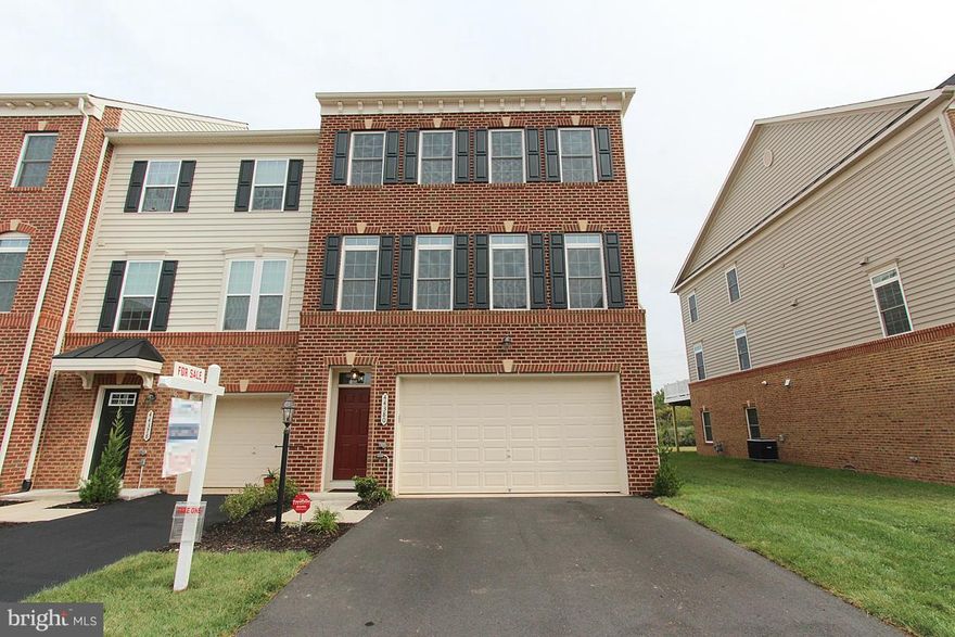 Enjoy  3,200 sqft of living space in this 2-Car Garage, 4 bed 3.5 bath townhouse. Gourmet Kitchen with Stainless Steel Appliances, Granite Countertops, Hardwood floors and 10-feet extension. End-unit townhouse with a wide deck, brick-front and  backing to huge common area next to W&OD trail. Basement with 4th bed and full bath. Only two years old. Wait for a call or text back before showing.