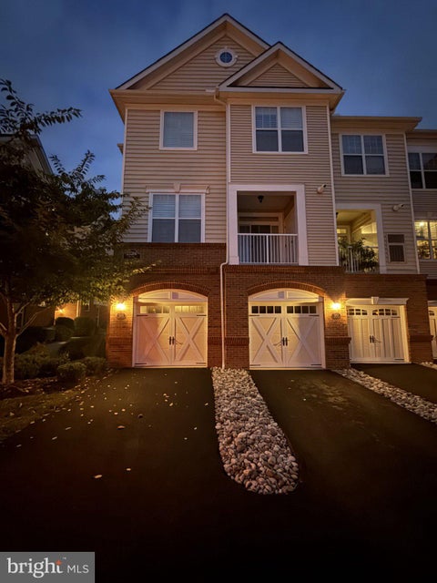 Photo of 23286 Southdown Manor Terrace #105, ASHBURN, VA 20148 (MLS # VALO2137186)