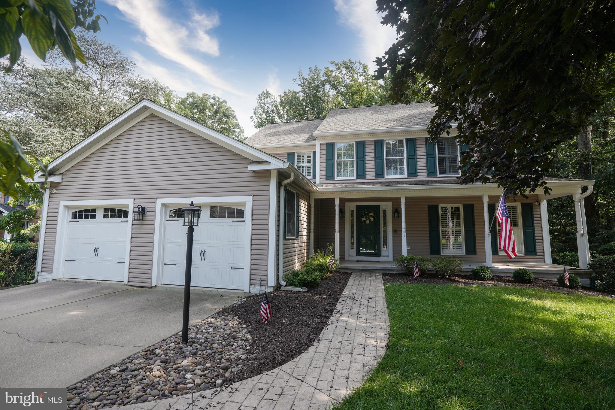 Starting School Year 2025-- Patapsco Woods is NOW in the Catonsville Middle School district! Walk out the front door onto a charming front porch & love the close proximity you will have to beautiful Patapsco State Park with hiking/biking trails, picnic/camping space & a playground. This home offers so much comfort, space & enjoyment. On the main level, in addition to an updated kitchen with a double oven & huge storage space (KraftMaid cabinets), large family room with gas fireplace, half bath, large dining & living rooms--all with hardwood floors--there is a heated sunroom with a stunning wood ceiling & skylights, overlooking the deck & woods of Patapsco State Park. Upstairs offers 4 bedrooms & 2 attractive full baths, both with double sinks. The primary bath features both a high-end tub & shower with pretty tile work. And bonus, there is a walk-in closet situated in the bathroom for convenience. The ceiling fans in this home are first-rate & there are also quite a few charming plantation shutters. Some of the newer features are: HVAC 2022 & all vents were just vacuumed, sump pump 2023, composite deck 2023, backyard fence 2023, brick patio 2022, washer & dryer 2023. The home also contains a central vacuum system and Generac 17 kw gas generator.
The large finished walkout basement has low-maintenance durable paneled walls, new ceiling, and recently professionally cleaned carpeting.
The backyard setting is perfect for the naturalist who wants to decrease the amount of lawn care to make their properties more sustainable and encourage natural ecosystems to recover. This type of landscape greatly decreases lawn cutting, pesticides & watering, helping with bills. Pellet stove in basement to be sold As-Is. Minutes away from all that Catonsville's village has to offer--restaurants, shops, services, parks, farmers markets, outdoor concert venues, etc. Life is Great in 21228!