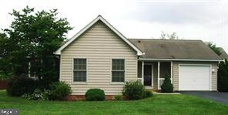 Charming one-level ranch home offered as-is, full of potential and ready for your personal touch. The home features a light-filled dining area with wraparound windows, a newer roof, and a deep one-car garage. A stunning Palladian window frames peaceful pond views, creating a beautiful focal point in the living space. Step outside to the back deck—perfect for relaxing evenings. With plenty of opportunity for updates and customization, this home is located in the highly desirable Laurel Ridge subdivision. Motivated seller—bring your vision!