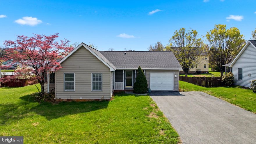 Charming one-level ranch home offered as-is, full of potential and ready for your personal touch. The home features a light-filled dining area with wraparound windows, a newer roof, and a deep one-car garage. A stunning Palladian window frames peaceful pond views, creating a beautiful focal point in the living space. Step outside to the back deck—perfect for relaxing evenings. With plenty of opportunity for updates and customization, this home is located in the highly desirable Laurel Ridge subdivision. Motivated seller—bring your vision!