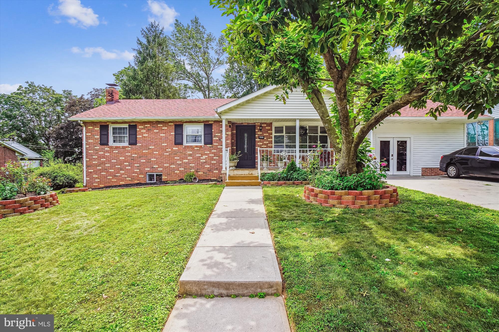 Welcome to this spacious 4BR, 3.5BA brick-front home with updates throughout! Features a wide driveway for 4 cars, new front and back doors (2023), and a covered front porch. Main level includes hardwood floors, a bright living room with bay window and recessed lighting, vestibule entry, and 3 bedrooms including an owner’s suite with private half bath.
The kitchen offers stainless steel appliances (fridge, stove, built-in microwave), black dishwasher, dual sink, built-in china cabinet, wood cabinetry, and a custom desk/hutch setup. Dining area and large family room with oversized windows feature engineered wood floors.
Fully remodeled bathrooms throughout. Oversized laundry/mud room with side entry, new washer/dryer (2023), utility sink, cabinets, and two closets. Main level has two full baths.
Finished lower level includes a spacious room, full bath, living room, kitchenette with stove and fridge, dining area, private entrance via side French door with walk-up stairs, and two additional rooms ideal for den/office/library with expansive closet space. Basement features engineered wood flooring, recessed lighting, sump pump, and pantry closet.
Additional highlights include dual-zone HVAC 2023, 50-gallon electric water heater 2023, brand new roof 2024 and large fully fenced backyard with concrete patio and shed with electric.
Prime location near Historic Downtown Frederick, major highways, train station, public transit, shopping, dining, library, and more.
All showings must be confirmed through ShowingTime. Any questions feel free to contact helpful/cheerful Listing Agent.
