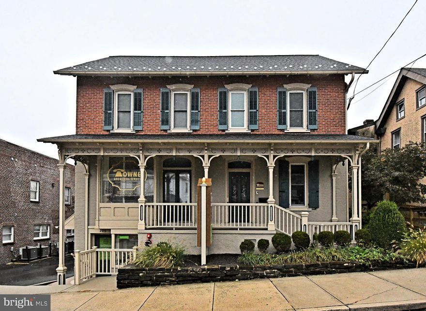 Built in 1886 this well maintained Commercial building offering the perfect blend of business and residential spaces in a thriving downtown location. Classic brickwork and architectural details make this property stand out.  Front porch welcomes you into the primary space.  Entryway and reception area, plenty of office space, conference room, kitchen area, and cooled server room.  Grand staircase takes you upstairs where you will find additional office space and storage space on the third floor.  Lower level space with separate entrance is a bright and open space with bathroom and large storage closet.
Upper level includes 2 residential apartments with kitchen, living room, and bathroom.  Ample parking is available in the rear lot or on the street.
Situated along Main Street in Souderton's vibrant business district this property benefits from excellent visibility, steady foot traffic, and proximity to popular shops and restaurants.  Whether you are an investor seeking a solid income producing property or an owner occupant looking to establish you business in a great downtown setting, here is a rare opportunity.