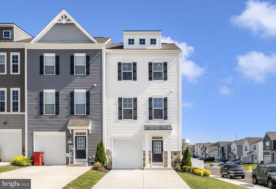 Move-in ready! This delightful 2,353 sq. ft., 3-bedroom, 2.5-bath end-unit townhome is just minutes from shopping and Interstate 81. The main level features a spacious living area with an electric fireplace, an open kitchen, a dining area, and a convenient half bath. The kitchen shines with a center island, sleek quartz counters, and stainless-steel appliances. The primary suite offers a walk-in closet and a full bath with a walk-in shower. Laundry, complete with washer and dryer, is located on the bedroom level for easy access. The lower level includes a spacious family room with rough-in for an extra full bath. You’ll also enjoy a 1-car attached garage and a private backyard with a vinyl fence.