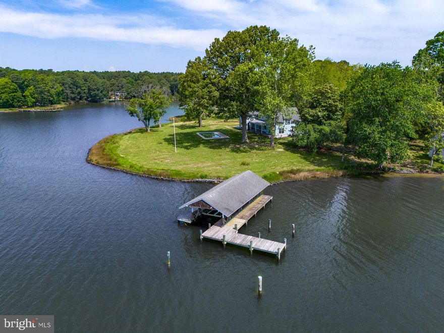 New Construction Waterfront in St. Michaels. Nantucket-Style Manor Home with everything on your “Wish List”. Main house with 5 Bedrooms (First Floor Primary Suite), separate study, first floor guest room (en suite); open floor plan with high ceiling, Family/Dining Combo, gourmet kitchen with quartz tops, Stainless Steel Appliances, mud room and a full bathroom to service the pool. Second Floor features Game Room, laundry room, two additional bedrooms (both en suite) and a second floor Primary Bedroom suite with private balcony. High-end materials and craftsmanship throughout. Additional features include a poolside porch with fireplace, patio with outdoor fireplace, covered front and waterside porches. A separate guest house (unfinished) on the water’s edge, in-ground pool, boat house with 7’+/- MLW, detached 3-car garage. Majestic Oak trees, breathtaking western exposure of San Domingo Creek.