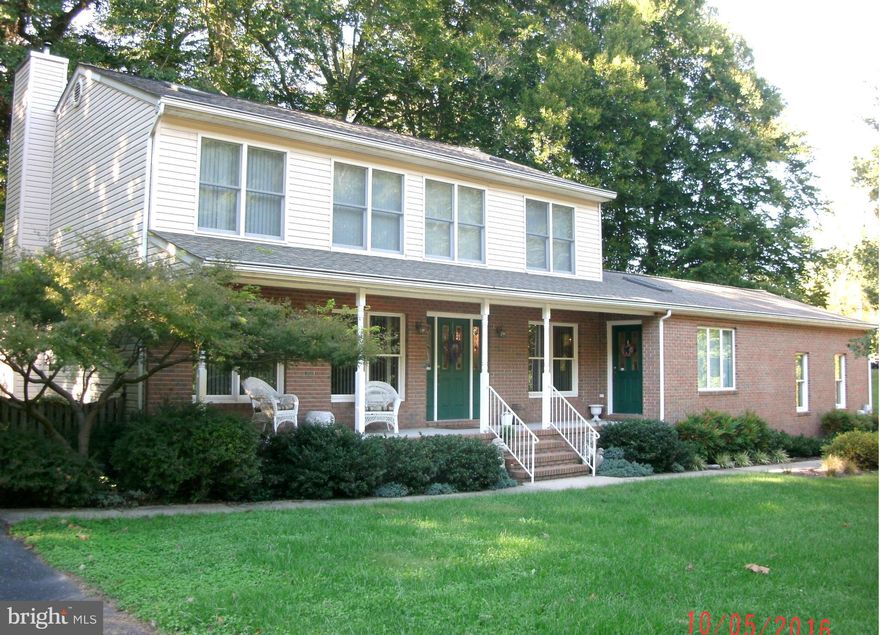 Cathedral ceilings, skylights and French doors make this Holt built porch front colonial bright and open! Spacious great room was once a professional office w/private door. Master BA has jetted tub,double vanity. Fam.Rm.has FP w/pellet insert. Parking for 15 cars +- or boat/RV, patio w/built-in SS grill, 18' above ground pool, new cover & pump, garage has bath rough-in. Andersen windows.