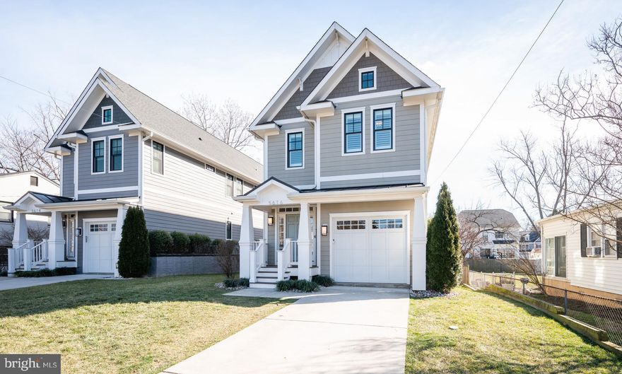 Put this one on your must-see list! Welcome to 5616 8th Rd N. This move-in ready 5-bedroom, 4.5-bathroom Craftsman was built in 2016 and offers an unparalleled combination of luxury, comfort, and convenience! The light-filled kitchen boasts beautiful tall cabinets and top-of-the-line stainless steel appliances. Entertain around the large kitchen island with sparkling quartz countertops. The kitchen opens to an awesome family room with a gas fireplace, and French doors open onto the large deck and fenced-in backyard, creating an ideal space for entertaining while enjoying the peaceful surroundings! Gorgeous hardwood floors flow throughout the main level, which includes a private office space. With recessed lighting, wainscoting, and plantation shutters throughout, this home truly has it all! Upper level features a large owner’s suite and 3 additional spacious bedrooms and their 2 secondary bathrooms, all with ceramic tile and high-end fixtures. Full sized laundry room on upper level. Each bedroom is generously sized, offering ample closet space for all your storage needs. Fully finished basement with 9-foot ceilings tops it all off. The basement includes a rec room, guest bedroom and full bathroom (perfect for an au pair suite or guests), and a bonus storage room. Large one-car garage offers plenty of storage room. This home is close to everything: the redeveloped Ballston Quarter, Arlington Forest Club, the Bluemont-Junction trail and bike path, Bluemont tennis courts, and the Pentagon. Just minutes to DC via Rt. 50 and National Landing (Amazon's new headquarters). Take advantage of this beautiful home and all this spectacular area has to offer! 
OFFER DEADLINE MONDAY FEB 12TH AT 6:00PM