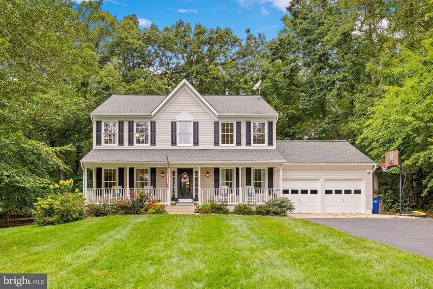 Move-in ready, spacious colonial on one of the largest and most secluded lots in amenity-filled Cardinal Forest! Gorgeous Pergo flooring (2022), thoughtful upgrades, and neutral paint colors throughout the main level. You'll love the kitchen with refaced cabinetry, upgraded granite counters (2024), new dishwasher and oven (2023), and massive pantry. The perfect layout for entertaining with both formal dining and formal living rooms in addition to the nicely sized family room. Plenty of space to spread out! Upstairs you'll find a generous primary suite with renovated bathroom boasting a standalone tub and walk-in shower. Three more nicely sized bedrooms, another full bathroom, and recently renovated laundry closet finish the upper level. Head down to the fully finished basement to explore the recreation room, two bonus NTC bedroom/flex rooms, and another full bathroom. Out back you'll find a large deck with plenty of room for your grill and conversation set! The expansive backyard is fully fenced (2022) and completely tree-lined! The swing set and storage shed also convey and the shed has electrical already in place. You'll love all the privacy this beautiful lot offers while still getting to enjoy the perks of neighborhood living with amenities like a community pool, club house, playground, tennis courts and more! Only 15 minutes to downtown Fredericksburg, 30 minutes to Quantico, and close to shopping and commuting options, you can't beat the location! Home has been meticulously maintained and pride in ownership shows throughout!