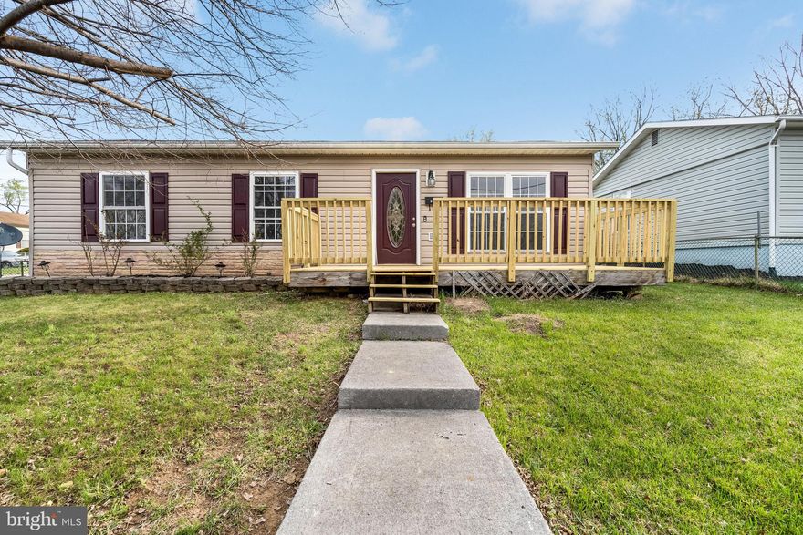 Beautiful recently remodeled rancher with brand new kitchen with soft close cabinetry and quartz countertops and stainless steel appliances. New flooring and paint throughout the home as well as a new hot water heater, new vanities, lights, faucets and fixtures. This home is completely turnkey and ready for its new owner. 3 bedrooms 1.5 bathrooms and a great fenced in backyard and front yard located on a nice corner lot. You can Enjoy morning coffee out on the newly built front deck as well.