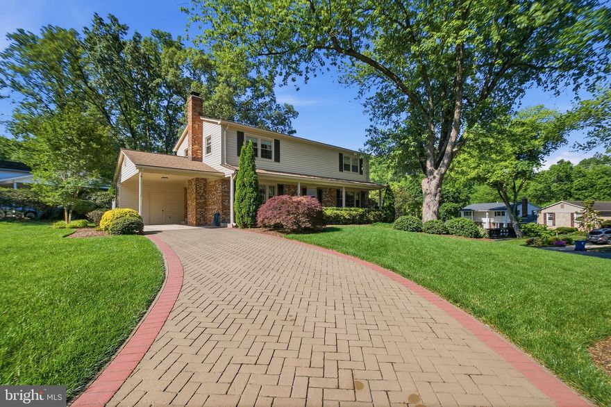 Ideally located in the community of  Orange Hunt West, this stately  colonial home offers a pillared front porch and welcomes you with a bright,airy entrance foyer that sets the tone for comfort in the traditional design found throughout the home. Spanning almost 3000 finished square feet, the interior features a thoughtfully appointed  layout with four spacious bedrooms and three and a half bathrooms, ensuring ample space for relaxation and entertainment. The heart of the home is the bright inviting kitchen with maple cabinets- adorned with upgraded countertops and almost new stainless steel appliances (upgraded Kenmore )which also includes  a pantry plus a built in desk perfect for planning and preparing meals. Next to the pantry you will find a convenient laundry chute to the lower level laundry room. The house plan also offers a more formal living room and dining room for gatherings. Enjoy cozy evenings in the family room, complete with a gas fireplace framed by glass doors, or access the patio through an upgraded sliding glass door to the patio for barbecues and entertaining. Upstairs, retreat to the spacious  primary suite  with adjoining updated bath, vanity area and shelved walk-in closet .The additional three nice sized bedrooms share  an updated hall bath and provide flexibility for family and/or guests. The  partially finished basement provides versatile living space for the creative and handy household offering a  spacious rec room with built in bookcases plus  a private den/office area. The  large workroom (12x25)-complete with workbench, craft desk and extensive shelving- is a dream for hobbyists and DIY enthusiasts alike. Washer, Dryer, extra refrigerator, new hot water heater and heat pump(Rheem 2024)  are in utility room beside a nice size cedar closet. Step outside to the carport, complete with attached shed ,conveniently accessed from the kitchen/family room .A separate free standing shed in the back yard provides even more storage. The imprinted asphalt driveway offers ample  parking spots. Situated on a quiet cul de sac, this home is professionally landscaped and the meticulously maintained grounds reflect the pride of ownership that defines every corner of this exceptional property. This home feeds the highly regarded  West Springfield High School pyramid to Irving and Sangster Elementary(being at  very top of the elementary schools in Fairfax County). Enjoy this  prime location -- conveniently located near shopping, a public library, South Run Rec Center, public transportation and commuter lots , the Fairfax County Parkway, Springfield Metro Station and express lanes to Washington, DC. For commuters, this location is simply unbeatable!!