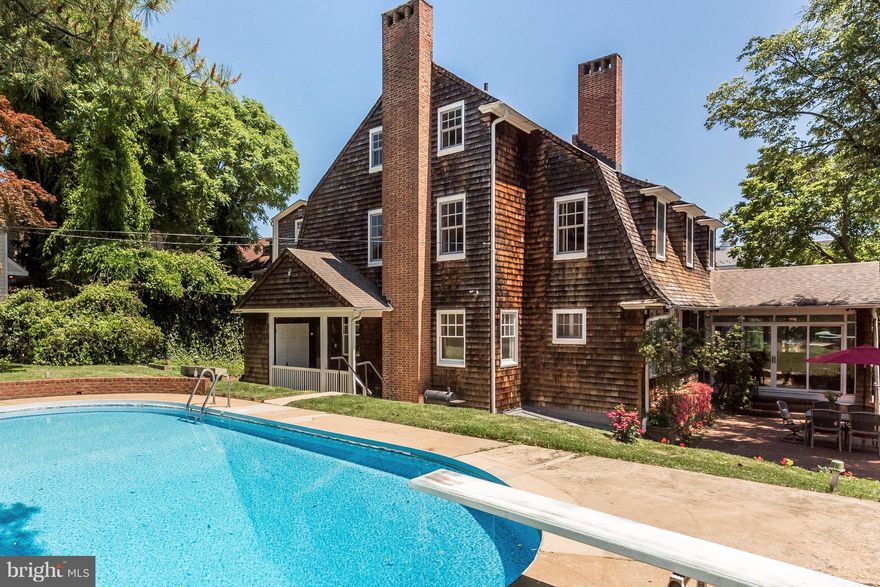 1 short block to Church Circle on .26 acres this home has it all Carport parking & in-ground pool!Only 3 owners,110 yrs! Beautiful, important Shingle-style home on 3 levels w/ lg sunny rms, marries recent modern updates w/ original trim & doors, banks of pretty leaded glass windows, beamed ceilings & walls,graceful staircase&long leaf pine flrs.Good bathrooms,closets &storage+lg. terrace.Gorgeous!