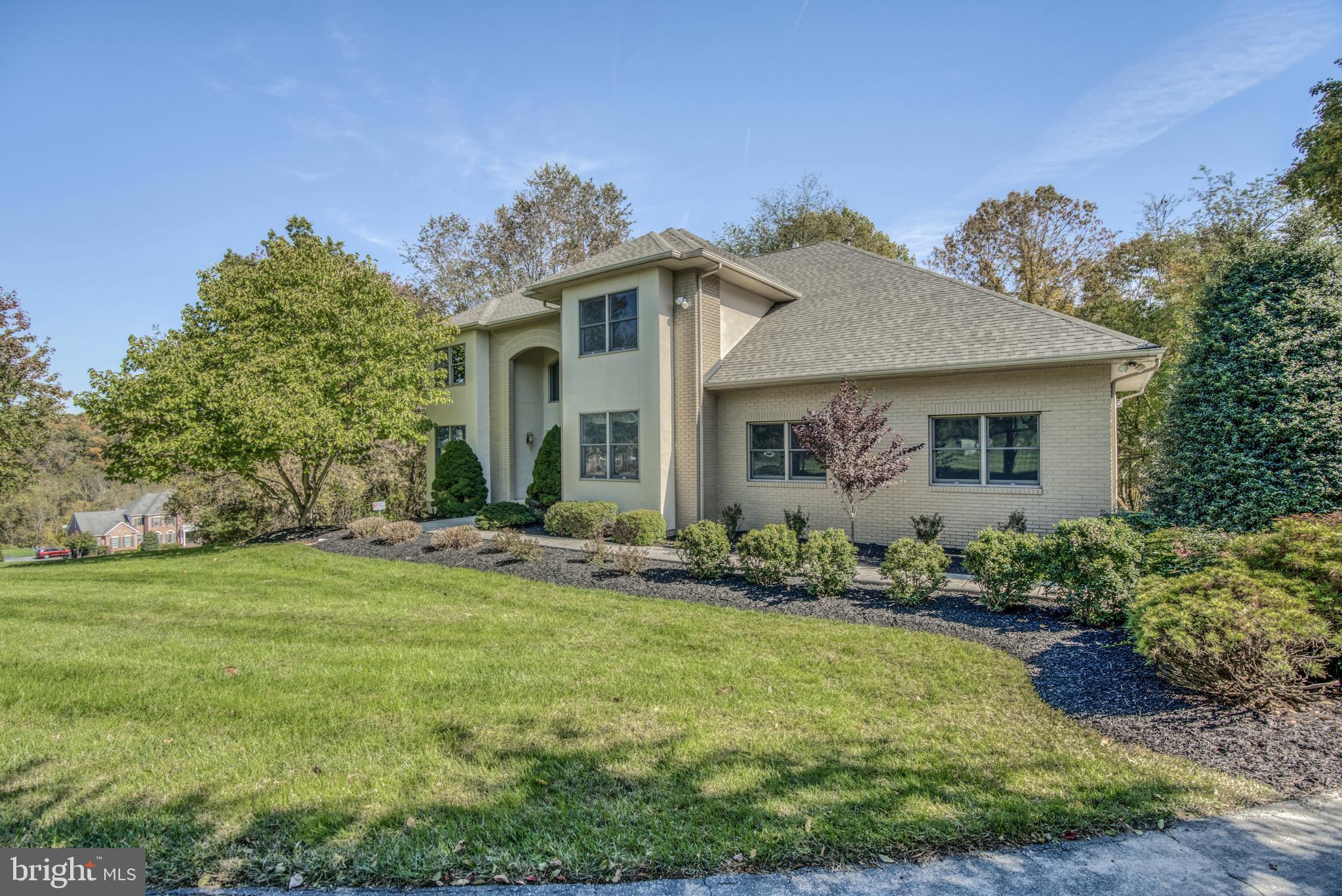 Exquisite approximately 5,800 sf home in desirable private community. Close proximity to local conveniences. Home features grand 2 story foyer open to 2nd floor gallery; gourmet kitchen with two sided fireplace & top of line appliances, Wolf double oven, island w/Jennaire, custom cabinetry & granite counters. Deck off kitchen & dining room wraps the entire back of house offering gorgeous park like views of 3.83 lush acreage. Master Bedroom with adjoining wet bar, luxury bath & custom walk in closet. Professional wine cellar & rec room. Come see for yourself!!!