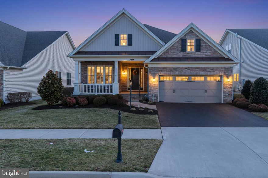 Welcome to Regency at Creekside, where every day feels like a retreat and neighbors quickly become friends. This thoughtfully expanded home offers over $200,000 in upgrades and enhancements.  A beautiful flagstone front porch welcomes you to the front door. Inside, every room has been elevated, and the footprint has been expanded to create a larger family room, more generous dining space, and an enlarged basement. The home feels open, comfortable, and beautifully designed for both entertaining and everyday ease. The main level features a kitchen fully upgraded with cabinetry, elevated fixtures, and double wall ovens creating a space that is as functional as it is polished. There is plenty of room for entertaining: relax in the living room by the fireplace equipped with a home theater with surround sound and share a meal with friends in the dining room. Enjoy the added bonus of a study. Retreat to the spacious primary suite with walk-in closet and en-suite bathroom. There is an additional bedroom with hall bathroom. Downstairs, the finished lower level offers taller ceilings, additional bedroom and full bathroom, a large recreation room, walk-up basement stairs, home theater, and endless flexibility for guests, hobbies, or hosting family. Outdoor living continues with an expansive Trex deck ideal for gatherings or peaceful evenings. An irrigation system keeps the landscaping lush with minimal effort. An oversized two-car garage provides generous space for vehicles, storage, and hobbies. Residents enjoy exceptional amenities including indoor and outdoor pools, tennis courts, fitness center, and an elegant clubhouse designed for community, activity, and effortless living. This is resort-style 55+ living at its finest in one of Gainesville’s most sought-after communities.