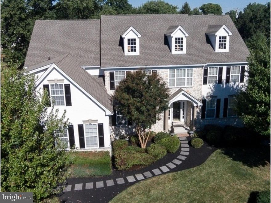 Stunning & Beautifully decorated 5 bedroom executive colonial home by Benson Homes (originally the community model home) in the exclusive most sought after neighborhood of Greystone and the Blue Ribbon Garnet Valley school district is a rare find and only available due to relocation. This gorgeous home is exquisitely decorated in designer colors and loaded with every upgrade imaginable - including a finished lower level with approximately 1,500 square feet of additional luxurious living space. This beautiful homes warmly welcomes you with its breathtaking center hall foyer and gleaming hardwood floors that flow throughout the first level, a regal turned staircase and gorgeous mill-work. An exquisite gourmet chefs kitchen with granite counters and center island, upgraded top end cabinetry, stainless appliances, designer back splash, recessed lighting, double ovens, pantry and a bright & sunny breakfast room that walks out to a peaceful deck overlooking the beautifully landscaped and irrigated yard. The luxurious family room is bright and cheery, featuring a vaulted ceiling and gas fireplace, and there is a main floor private study. The stately formal living & dining room suit feature exquisite triple crown molding and chair rail. On the second level, the extravagant master suite is complimented with an exquisite tray ceiling, two large over sized walk in closets, and a bright & grand tiled master bath with his & her vanities and Jacuzzi tub, as well as a sitting area. Four additional spacious bedrooms and two additional baths complete the upper level including a Jack & Jill Suite, a Princess Suite, and 5th bedroom with side hall access to a full bath. The spacious laundry room is located on the upper floor for convenience. The finished lower level includes a large recreational room, theater area, wet bar and lots of storage.  In the heart of Garnet Valley and its family amenities including The Brandywine Youth Clubs, Darlington Arts Center, Dance Studios and other activities for youths, and just down the street from Bethel Springs Elementary School, this home provides easy access to all major routes to corporate centers, shopping and Philadelphia, Wilmington and NYC.
