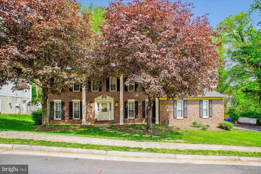 This beautiful brick colonial home is the discriminating buyers’ dream:  Fantastic 4 bedroom, 2 ½ bath home with a fabulous in- ground heated pool, excellent location, walking distance to the Vienna Metro and NO HOA. Major updates have been made in the last 5 years:  New roof and attic insulation in 2022, Electrical panel (with surge protection) and water heater replaced in 2023, new multi- tier Trex decking, new driveway and garage door openers in 2024 plus a new pool heater and backyard fence in 2025, just to name a few.  The main floor features an open floor plan with hardwood floors, family room with a wood burning fireplace  and a completely renovated powder room (2024).  The dream kitchen features stainless steel appliances, including new oven & trash compactor (2024) and dishwasher (2022), beverage fridge, Miele espresso machine, warming drawer and induction range.  Crown molding, new lighting and plantation shutters are prominent details  seen throughout the home.
The upper level is home to the master suite, which includes a cozy gas fireplace, spacious walk-in closet, and a beautifully updated ensuite bath featuring skylights and a large glass walk-in shower. Three additional generously sized bedrooms and a fully updated full bath complete the upper level, offering ample space for family members or guests.
The private backyard, surrounded by mature trees, provides a peaceful retreat with plenty of space to unwind or entertain. The new Trex multi-tiered deck is perfect for outdoor dining, lounging, and enjoying the in-ground pool, making this area a true oasis.
With thoughtful updates, high-end finishes, and a prime location, this home is ready to move in and offers everything today’s discerning buyer is looking for.