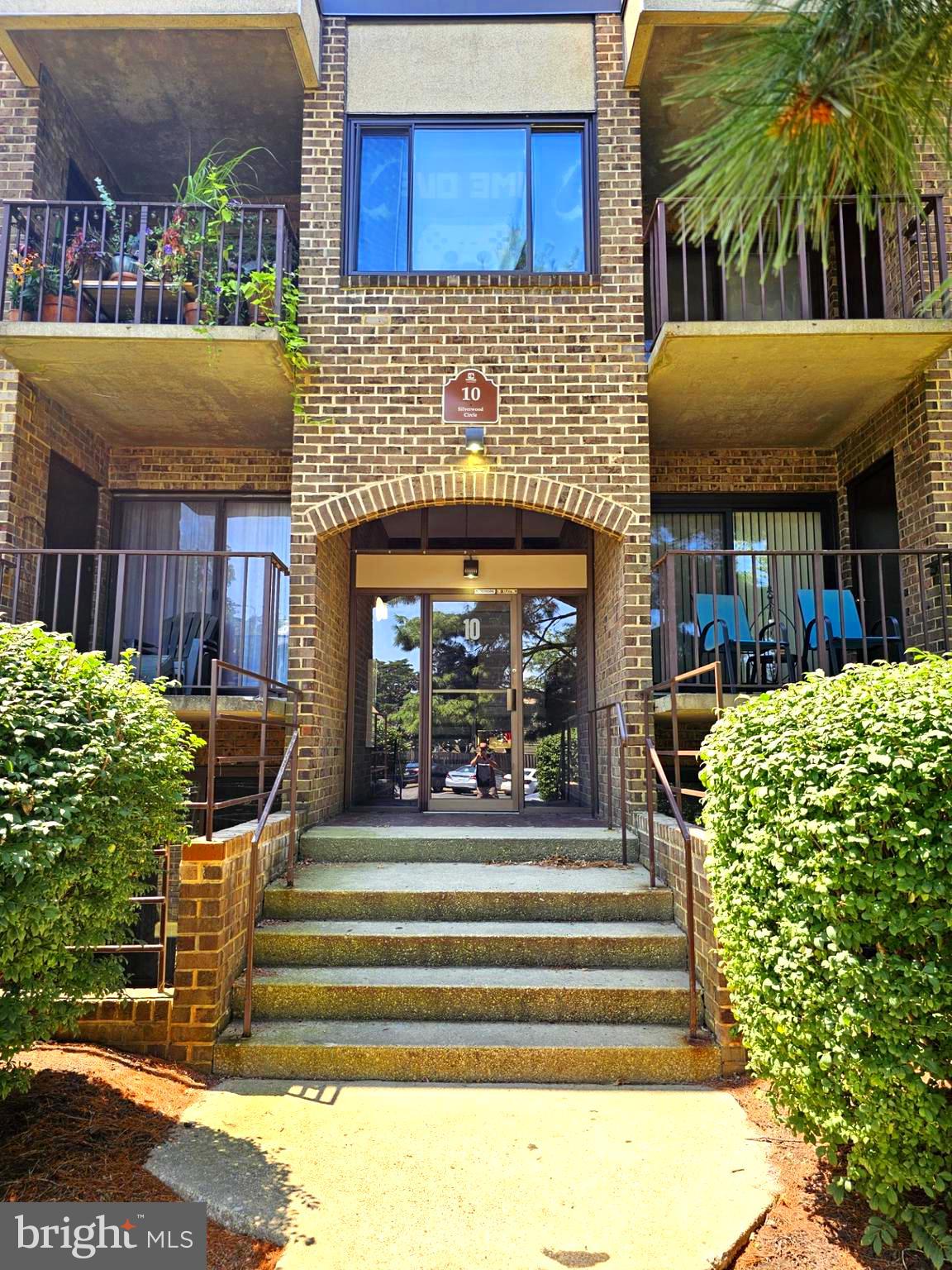 Welcome Home to 10 Silverwood Circle in the Fairwinds of Annapolis Community. Located minutes from shopping, dining, and everything downtown Annapolis has to offer, this beautifully renovated 2 bedroom, 2 bathroom condo blends modern style with everyday comfort. Step inside to find luxury vinyl plank flooring, updated HVAC and windows. Set the mood with dim to warm LED lighting you can adjust via remote control right from your sofa. Bring your speakers to enjoy the built in surround sound. The galley kitchen features dark stainless steel Whirlpool appliances, granite countertops, a double-wide, deep sink with modern faucet, a breakfast nook, and opens to a separate dining room, perfect for casual mornings and hosting friends. The spacious living room flows to your private balcony with utility room access. a great spot for morning coffee or quiet evenings. Your primary suite is a retreat, with a walk-in closet, built-in vanity, space for a sitting area, and a private en-suite bath with marble topped vanity. A second bedroom and bathroom (with walk-in shower and granite countertop), offer flexibility for guests, work, or hobbies. In-unit laundry with oversized washer and dryer make life easier! Gas and Water included in the condo fee. Community pool with pass currently only $5/yr, up to 6 passes per unit! Be sure to check out the tennis court, (pickleball, anyone?) two playgrounds, athletic field, and picnic area during your showing!
Disclaimer: This listing description is intended to meet Maryland Real Estate disclosure laws and NAR guidelines. All information provided is deemed reliable but is not guaranteed and should be independently verified. Photos may contain items not included in the sale. Features, finishes, dimensions and fees are subject to change without notice. Buyer is responsible for verifying all community rules, regulations, fees, and eligibility requirements. Listing broker and seller make no representations regarding condition beyond those required by Maryland Law. No statement, verbal or written, shall constitute a warranty of any kind except as expressly set forth in a fully executed purchase agreement. Property is sold "as-is" unless otherwise noted in writing.