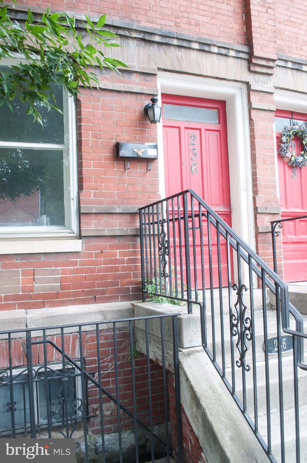 Charming and spacious 2 bedroom, 2 bath townhome in the heart of downtown Martinsburg. Close to shops and restaurants and in a great commuter location as well. This townhome is freshly painted and will be getting new flooring in kitchen, bathroom and dining room as well! Large parking area in the rear, a must see!